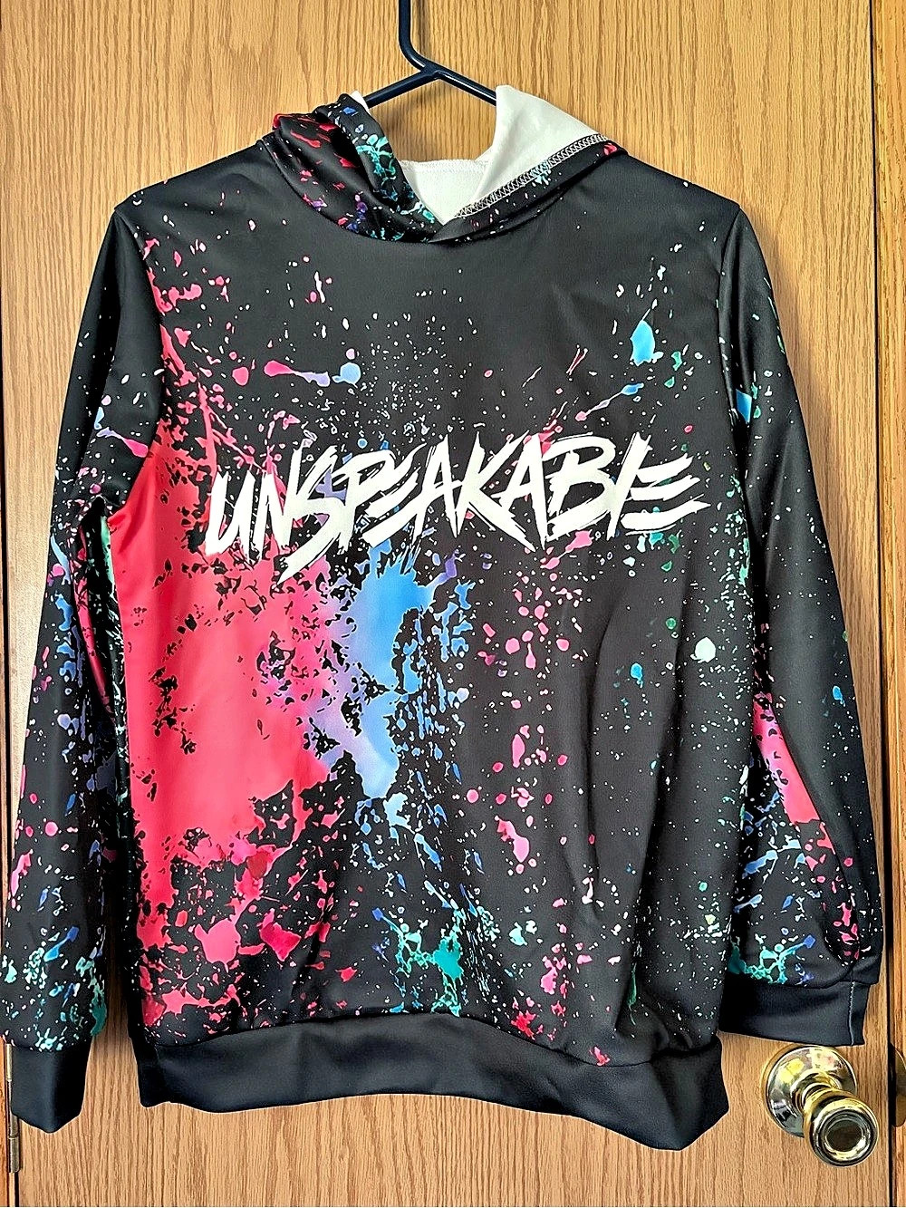 Unspeakable Paint Splatter Hoodie Black & Pink